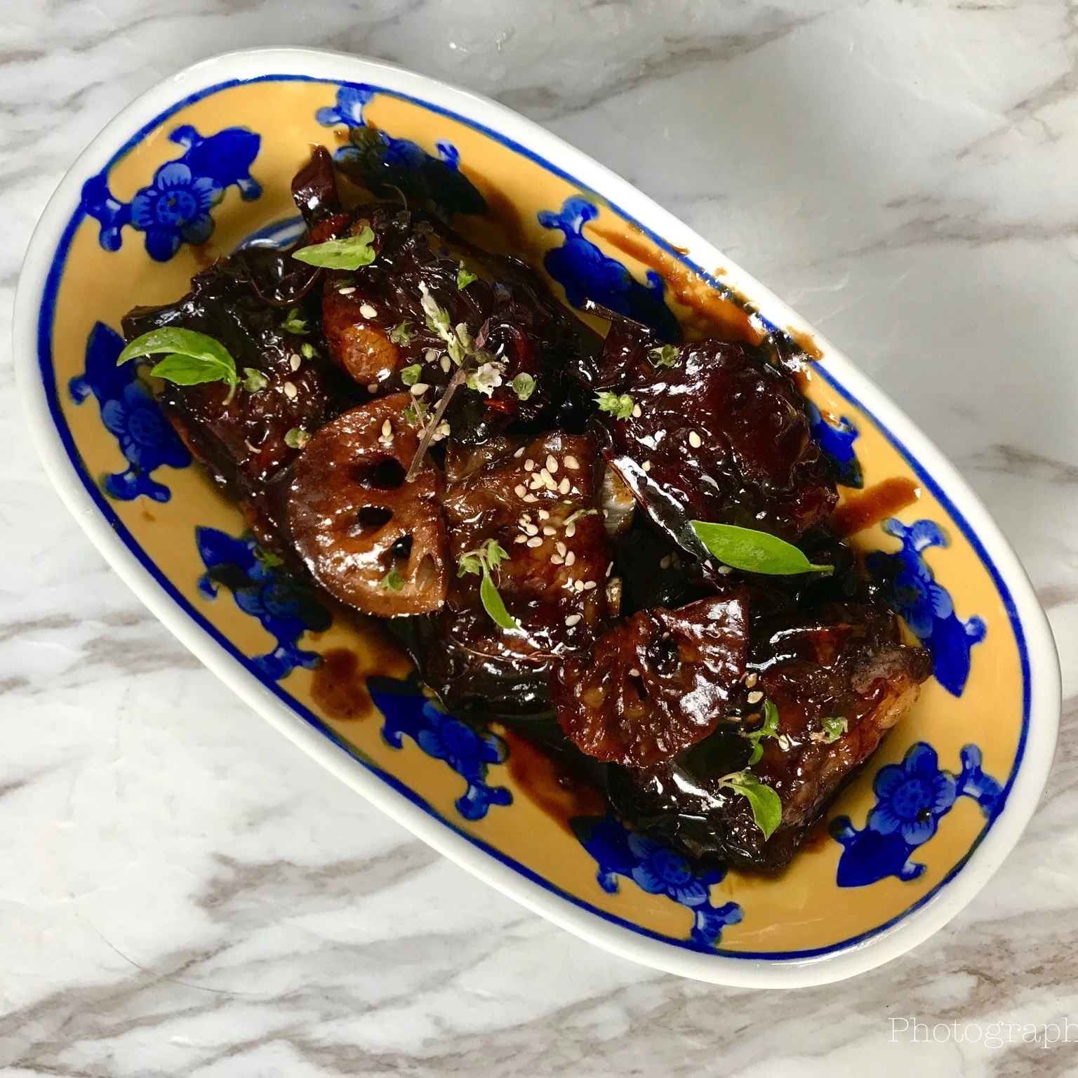 SƯỜN XÀO CỦ SEN CHUA NGỌT